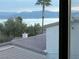 Rooftop view of mountains and lake through a window at 262 Big Horn Dr, Boulder City, NV 89005