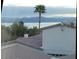 Scenic view from rooftops of mountains and lake with palm trees at 262 Big Horn Dr, Boulder City, NV 89005