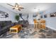 Open living room with modern furniture, ceiling fan, and view of dining area at 262 Big Horn Dr, Boulder City, NV 89005