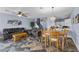 Open living area features a dining table and access to the modern kitchen in the background at 262 Big Horn Dr, Boulder City, NV 89005