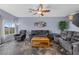 A cozy living room with plush furniture, a wooden coffee table, and stylish flooring at 262 Big Horn Dr, Boulder City, NV 89005