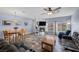 Spacious living room and dining area featuring modern decor, tile flooring, and an open layout at 262 Big Horn Dr, Boulder City, NV 89005