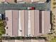 Birds eye view of clay tile roofs with surrounding shrubbery, street, and parked vehicles at 262 Big Horn Dr, Boulder City, NV 89005