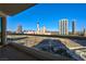 Condo balcony overlooking city skyline featuring tall buildings and desert landscape at 2747 Paradise Rd # 801, Las Vegas, NV 89109