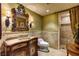 A charming full bath features a custom vanity, toilet and shower at 2747 Paradise Rd # 801, Las Vegas, NV 89109