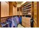 This walk-in closet offers ample storage space with built-in shelving and hanging rods at 2747 Paradise Rd # 801, Las Vegas, NV 89109