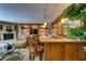 Living room boasting custom shelving, a wet bar, and stone floors at 2747 Paradise Rd # 801, Las Vegas, NV 89109