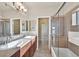 Bathroom with double vanity, tile floors, and shower/tub combo at 3550 Bay Sands Dr # 2087, Laughlin, NV 89029