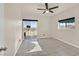 Spacious bedroom with tile flooring, ceiling fan, and private balcony access at 3550 Bay Sands Dr # 2087, Laughlin, NV 89029