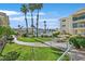 Lush landscaping and a manicured walkway lead to the pool and building at 3550 Bay Sands Dr # 2087, Laughlin, NV 89029