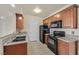 Functional kitchen with granite countertops and black appliances for a sleek look at 3550 Bay Sands Dr # 2087, Laughlin, NV 89029