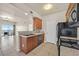 Open-concept kitchen with granite countertops and views of living area and balcony at 3550 Bay Sands Dr # 2087, Laughlin, NV 89029