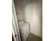 Laundry room features a white washer and dryer and a shelf for storage at 3550 Bay Sands Dr # 2087, Laughlin, NV 89029