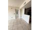 Spacious living area featuring tile floors and entry to kitchen at 3550 Bay Sands Dr # 2087, Laughlin, NV 89029