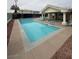 Community pool and hot tub with lounge chairs and a covered patio area at 3550 Bay Sands Dr # 2087, Laughlin, NV 89029