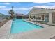 Community pool with lounge chairs and covered seating area offers a relaxing oasis at 3550 Bay Sands Dr # 2087, Laughlin, NV 89029