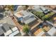 Aerial view of the home showcasing its landscaped yard, roof, and neighborhood at 4300 El Esteban Way, Las Vegas, NV 89121