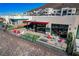 Modern house showcasing the outdoor patio with desert landscaping and mountain views at 431 Tranquil Peak Ct, Henderson, NV 89012