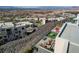 Scenic aerial view of the property, highlighting the modern design and surrounding hillside community at 431 Tranquil Peak Ct, Henderson, NV 89012