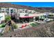 Aerial view of home with outdoor patio, fire pit, and outdoor seating area at 431 Tranquil Peak Ct, Henderson, NV 89012