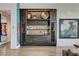 Custom bar area with built-in wine storage, shelving, and modern lighting at 431 Tranquil Peak Ct, Henderson, NV 89012