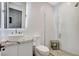 Modern bathroom with a glass shower, granite countertop, and designer fixtures at 431 Tranquil Peak Ct, Henderson, NV 89012