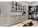 Spacious closet with custom shelving, drawers, and a center island for organization and display at 431 Tranquil Peak Ct, Henderson, NV 89012