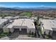 Modern home featuring a two-car garage and desert landscaping and mountain views at 431 Tranquil Peak Ct, Henderson, NV 89012