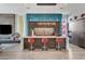 Stylish kitchen features an island with bar seating and custom cabinetry at 431 Tranquil Peak Ct, Henderson, NV 89012