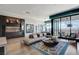 Open living space with modern decor, large windows, and a view at 431 Tranquil Peak Ct, Henderson, NV 89012