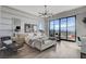 Luxurious main bedroom features hardwood floors, balcony, and city views at 431 Tranquil Peak Ct, Henderson, NV 89012