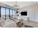 Luxurious main bedroom with floor to ceiling window views and built-in shelving and cabinets at 431 Tranquil Peak Ct, Henderson, NV 89012