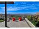 Stylish outdoor patio with comfortable seating, landscaping and amazing city views at 431 Tranquil Peak Ct, Henderson, NV 89012