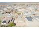 Wide aerial view of a quiet suburban neighborhood with mountain views at 5071 Andover Ct, Pahrump, NV 89061