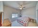 Bedroom with ceiling fan, natural light, carpeted floor, and closet at 5071 Andover Ct, Pahrump, NV 89061