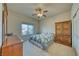 Guest bedroom with closet, carpeted floor, natural light and a ceiling fan at 5071 Andover Ct, Pahrump, NV 89061