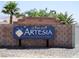 Artesia at Hafen Ranch community sign featuring landscaping and a decorative block wall at 5071 Andover Ct, Pahrump, NV 89061