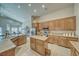 Eat-in kitchen features granite countertops, stainless steel appliances, and oak cabinetry at 5071 Andover Ct, Pahrump, NV 89061
