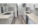 Spacious kitchen featuring stainless steel appliances, quartz countertops, and a sleek design at 5494 Waltham Ln, Las Vegas, NV 89122