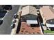 Aerial view of the property with fenced backyard, patio, and nearby street parking at 5820 Delaney Falls St, North Las Vegas, NV 89081