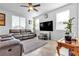 Comfortable living room with modern furniture and plenty of natural light at 5820 Delaney Falls St, North Las Vegas, NV 89081