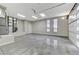 Spacious garage with epoxy floors, tall ceilings, recessed lights and ample storage at 5880 Westwind Rd, Las Vegas, NV 89118