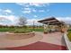 Community park with picnic tables and a gazebo for residents to relax and enjoy at 690 Monroe Hill Pl, Henderson, NV 89011