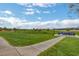 Expansive park with green lawns and workout area for residents to enjoy at 690 Monroe Hill Pl, Henderson, NV 89011