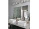 Dual sinks offer plenty of space in the bathroom at 8125 Rio De Janeiro Dr, Las Vegas, NV 89128
