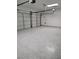 A spacious garage with a modern epoxy floor at 8125 Rio De Janeiro Dr, Las Vegas, NV 89128