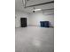 Large garage with sealed floors offering plenty of room for storage and two vehicles at 8125 Rio De Janeiro Dr, Las Vegas, NV 89128