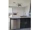 Open kitchen with stainless steel dishwasher, sink, and granite countertops at 8125 Rio De Janeiro Dr, Las Vegas, NV 89128