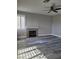 Bright living room with a cozy fireplace and ample natural light at 8125 Rio De Janeiro Dr, Las Vegas, NV 89128