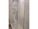 Bathroom shower with a glass door and large rain shower head at 8125 Rio De Janeiro Dr, Las Vegas, NV 89128